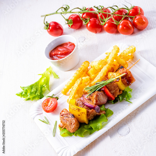 shish kebab skewers with marinated ham meat paprika and red onion