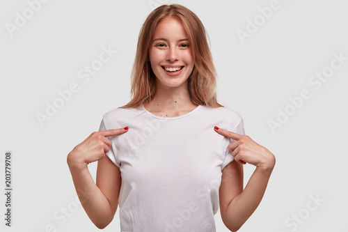 Happy glad attractive woman with lovely look, broad shining gentle smile, ind...