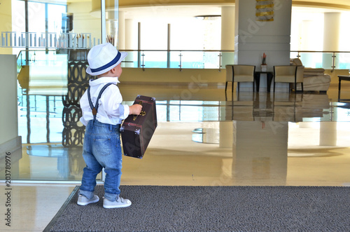 Young traveler with a suitcase