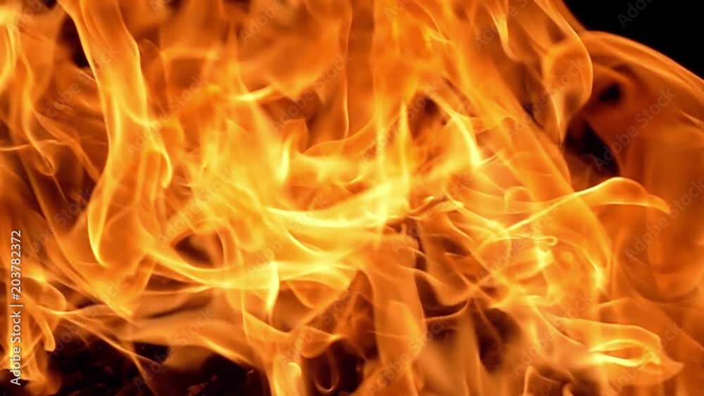 Flames of fire on black background in slow motion Flames of fire on black background in slow motion