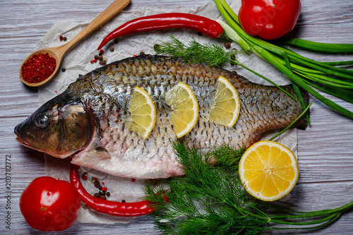 Carp fish with fresh vegetables