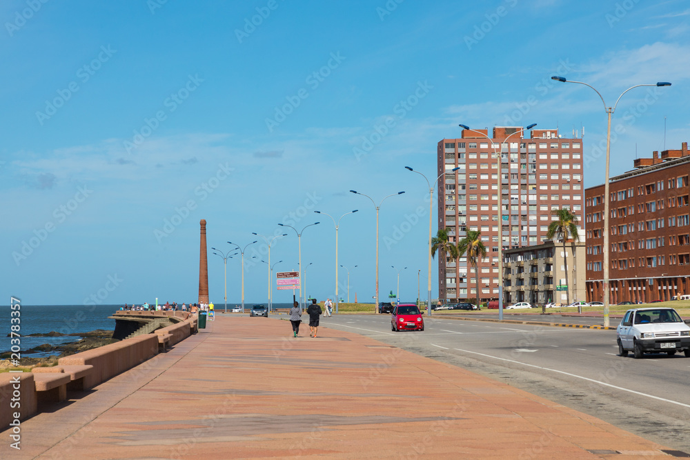 Fototapeta premium Residential buildings at boulevard in Montevideo, Uruguay. Montevideo is the capital and the largest city of Uruguay.