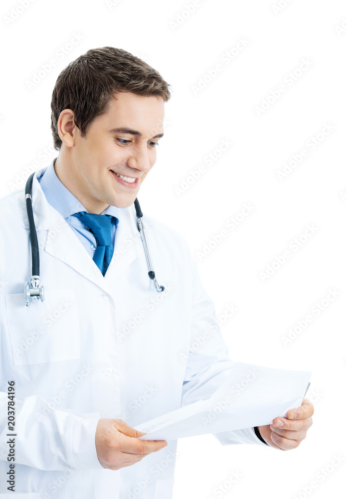 Happy smiling doctor reading documents, isolated Happy smiling doctor reading documents, isolated