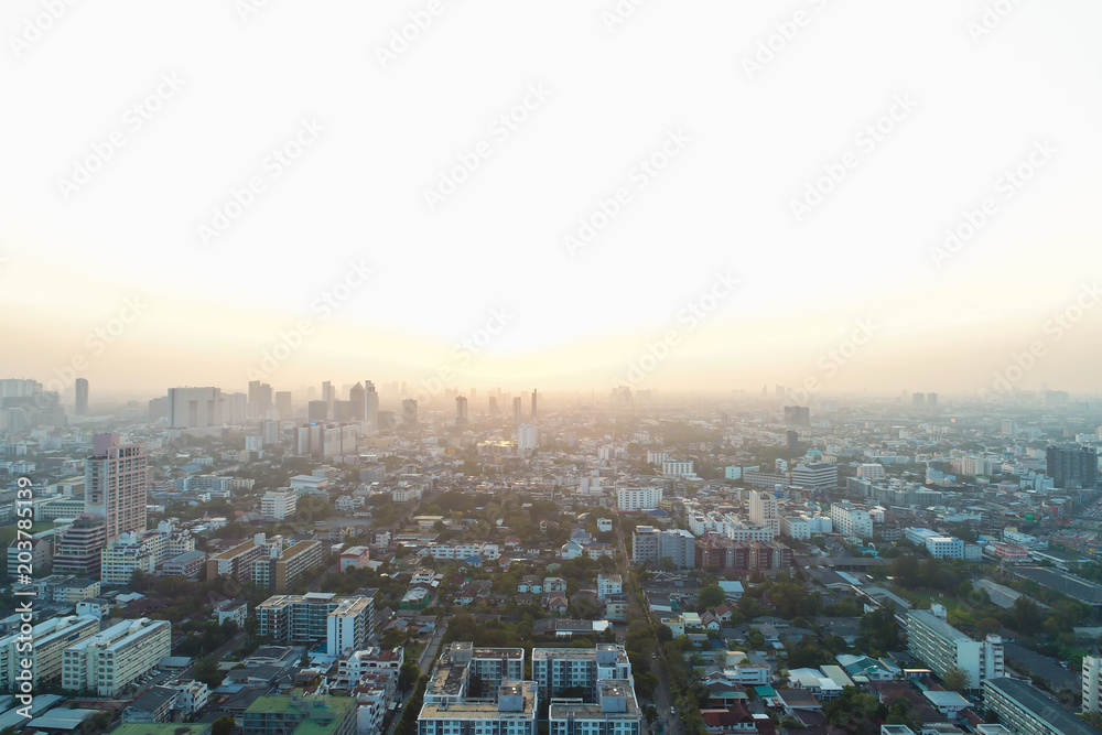 City building with road aerial view in sunset