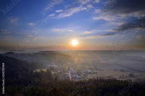 Sunset, view from Drabske Svetnicky, Bohemian paradise on Dneboh village photo
