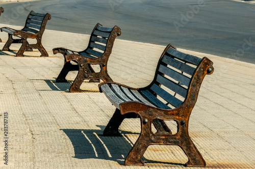 Fotografie, Tablou Old benches on the road