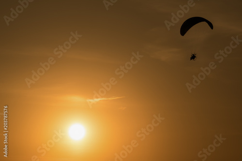 Paraglide in the sunrays