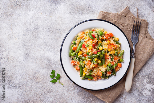 Vegetarian dish couscous with vegetables photo