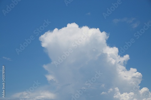 Fluffy Billowy Cumulus Cloud Cap in the Blue Summer Sky in Florida
