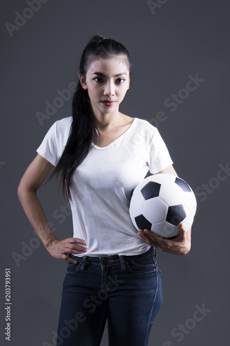 Portrait woman sports football isolated on white background © HNKz