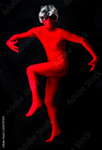 Adult senior man in red spandex body suit