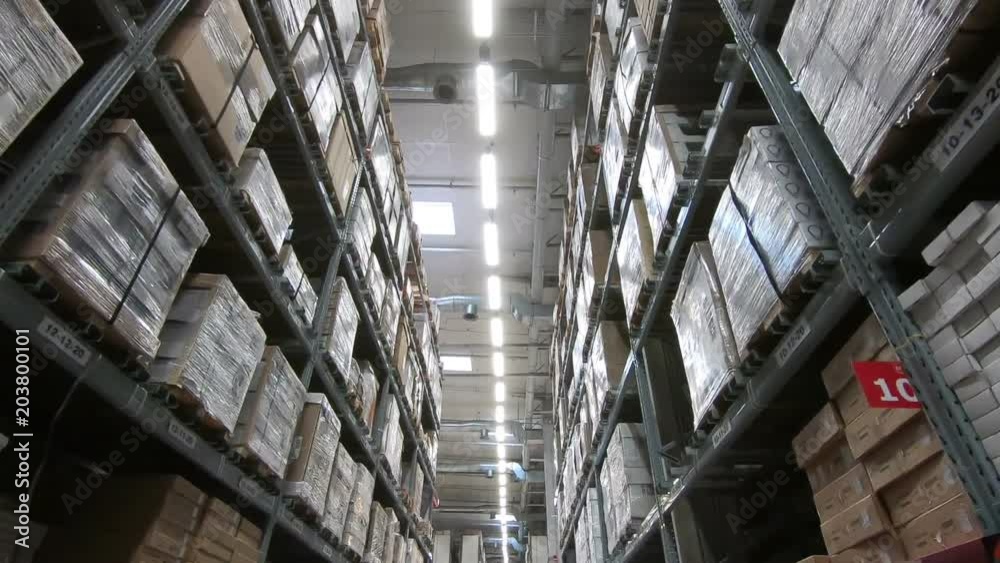 Moving in large storage warehouse factory Moving in large storage warehouse factory