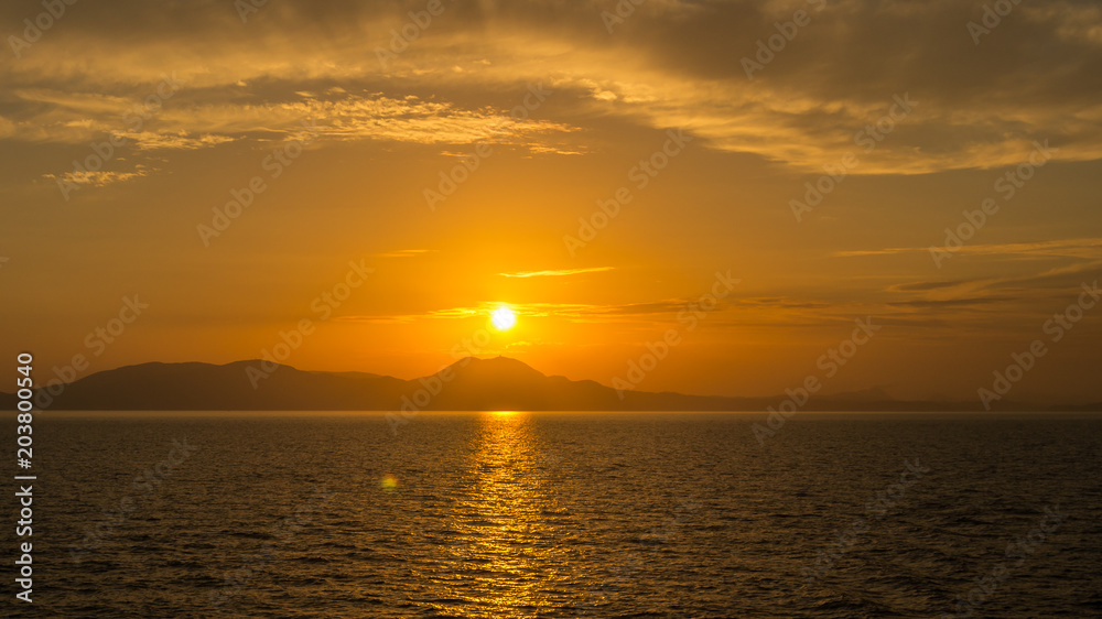 Sunset behind Corfu Island