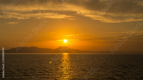 Sunset behind Corfu Island
