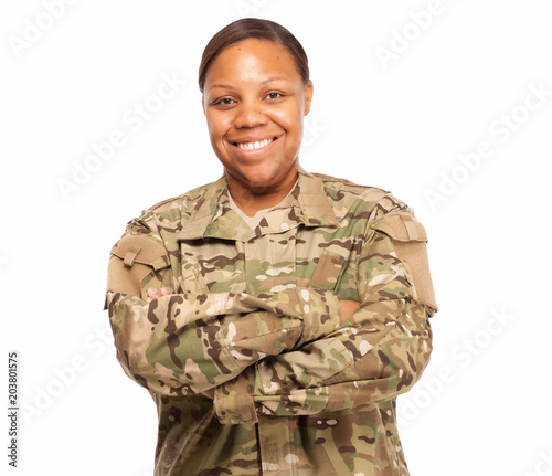 Happy female soldier in multicam uniform.