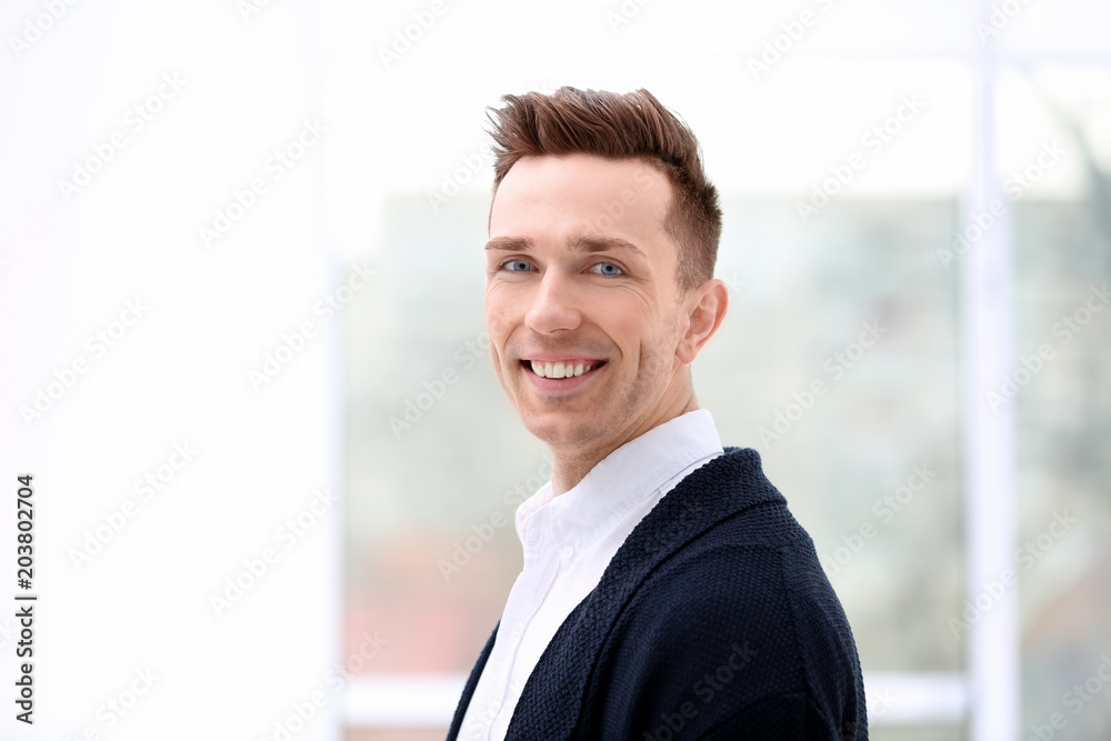 Young man in casual clothes on blurred background Young man in casual clothes on blurred background