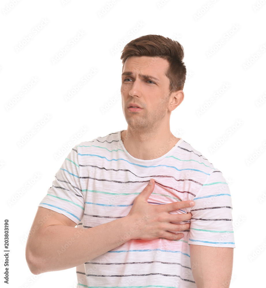 Young man having heart attack on white background Young man having heart attack on white background