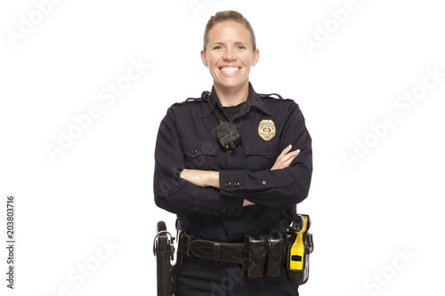 Fototapeta Female police officer with arms crossed