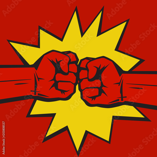 Two clenched fists bumping together