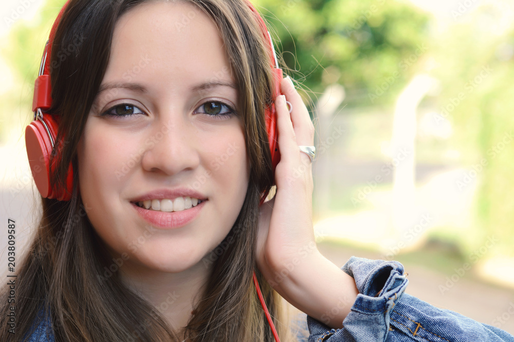 Young woman listening to music