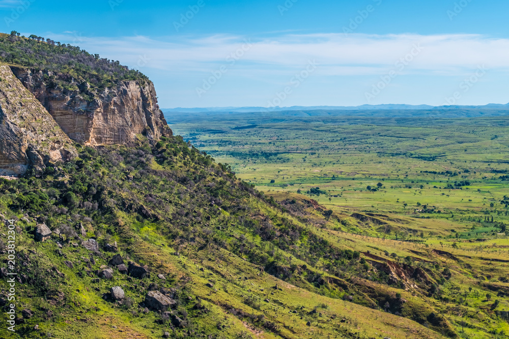 Isalo National Park  in the Ihorombe Region of Madagascar. Known for its wide variety of terrain, including sandstone formations, deep canyons, a palm-lined oases, and grassland, and rich wildlife