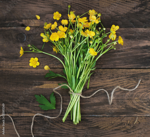 Yellow Little Flowers Bouquet gift Spring time Rustic Wooden Background Flat Lay Square Image