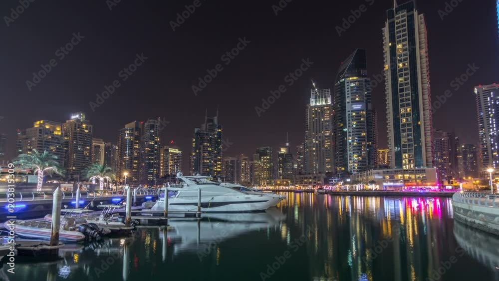 Dubai marina bay with yachts an boats night timelapse hyperlapse Dubai marina bay with yachts an boats night timelapse hyperlapse