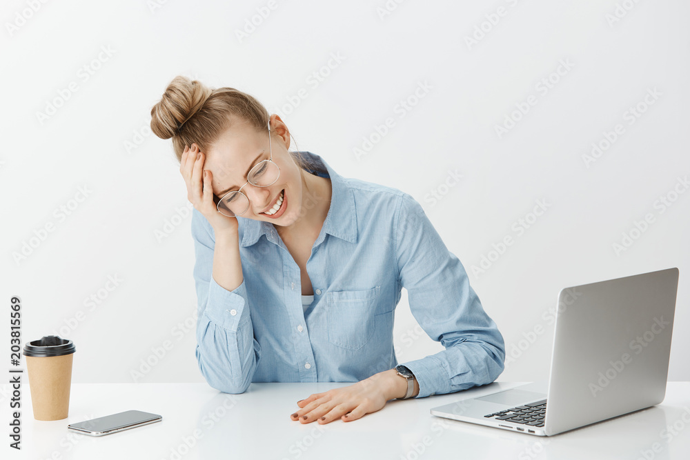 Nothing can be done to fix problem. Unhappy devestated female entrepreneur in glasses, crying, clenching teeth and touching forehead, looking upset at table while sitting near laptop and smartphone Nothing can be done to fix problem. Unhappy devestated female entrepreneur in glasses, crying, clenching teeth and touching forehead, looking upset at table while sitting near laptop and smartphone