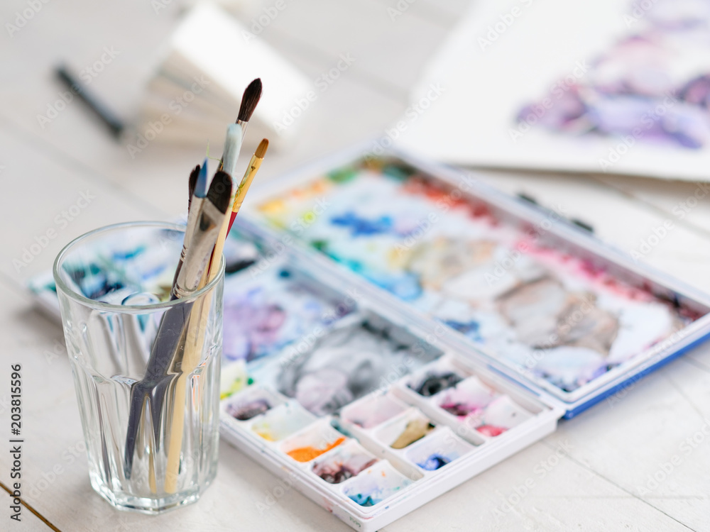 art therapy. painting classes or courses. creativity inspiration expression concept. watercolor inks palette and brushes art therapy. painting classes or courses. creativity inspiration expression concept. watercolor inks palette and brushes