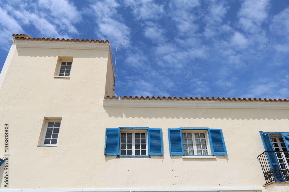 Blue window and blue sky