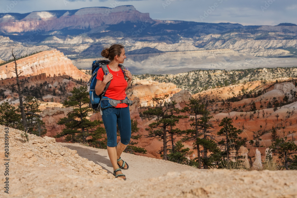 Hiker visits Bryce canyon National park in Utah, USA