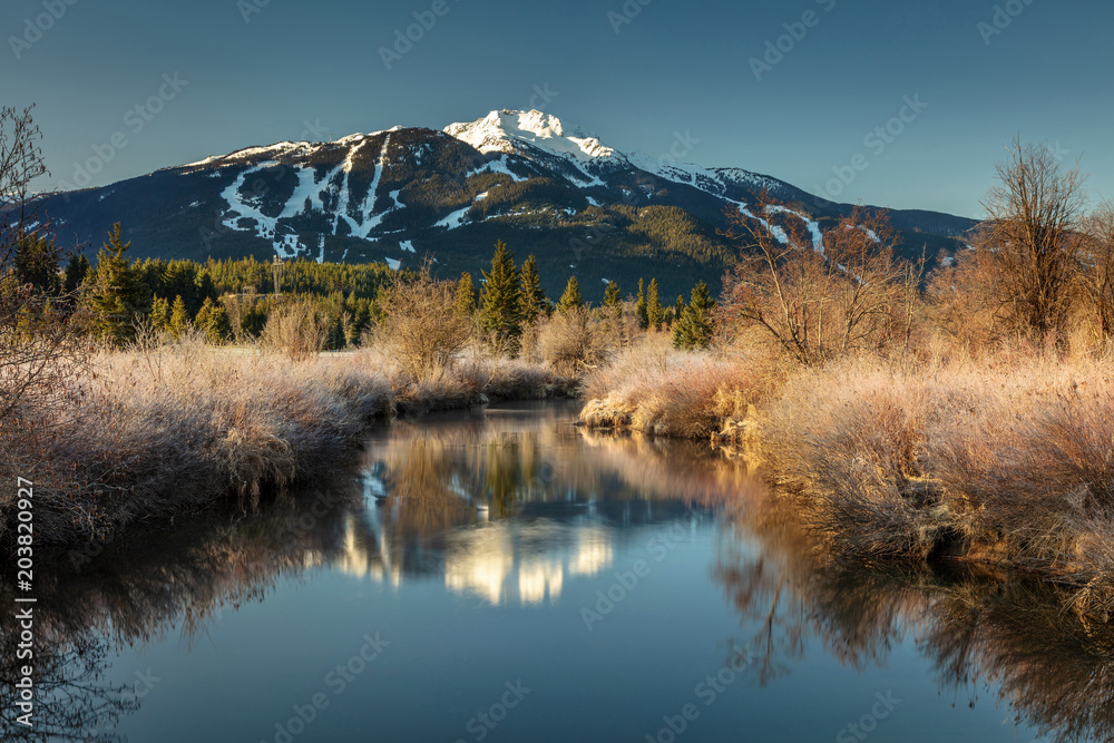 River Of Golden Dreams on a beautiful Spring morning with the reflection of Whistler Mountain.