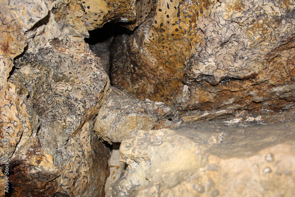 Obraz premium Quarry created artificially for the extraction of stone and created by nature.