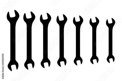Vector black double open ended wrench spanner set on white background