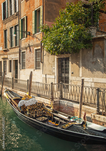 Narrow canal with restauran...
