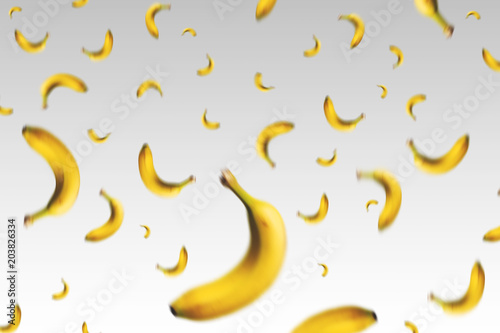 group of falling bananas in white background