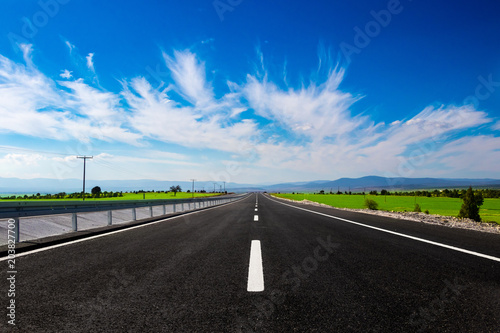 Highway under blue sky