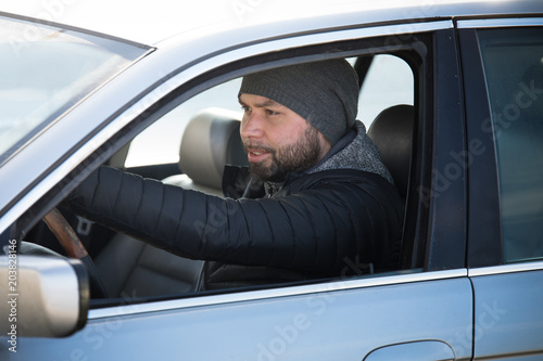 Portrait of man in his car. © Smart Future