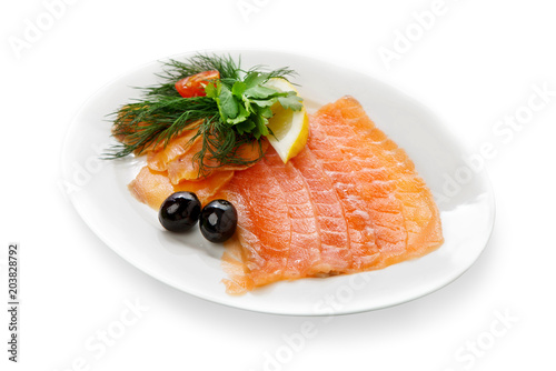 Smoked salmon pieces isolated on white background