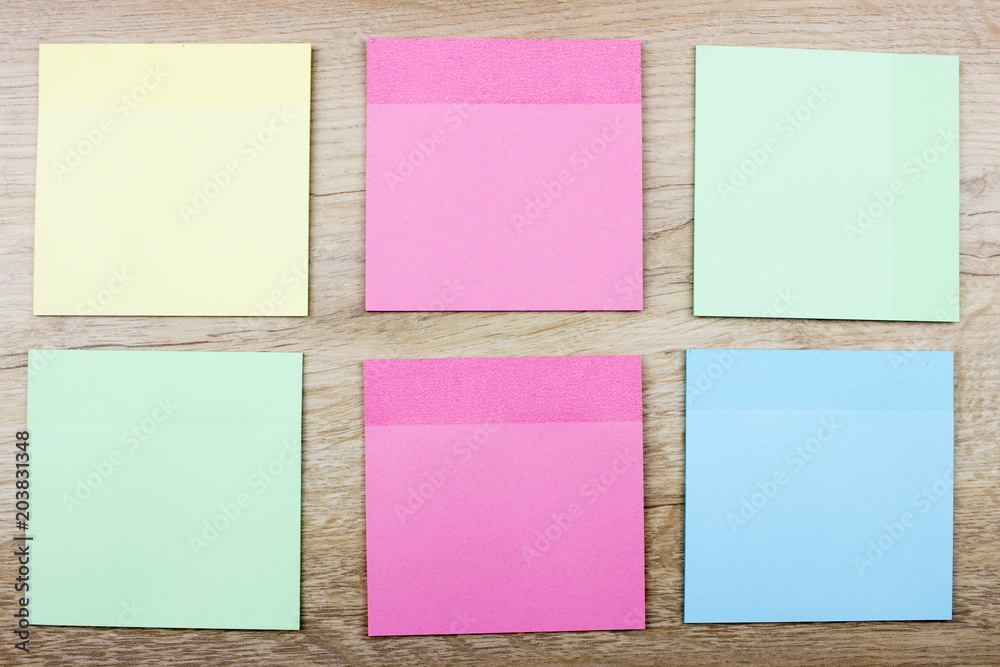 Сolorful paper blanks, Office concept. Empty space for design and text. Wooden desk Сolorful paper blanks, Office concept. Empty space for design and text. Wooden desk