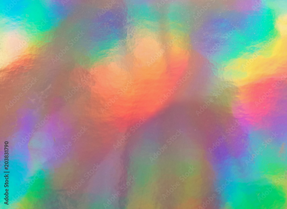 Holographic paper, rainbow silver textured background. 