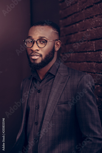 Smart young man wearing glasses