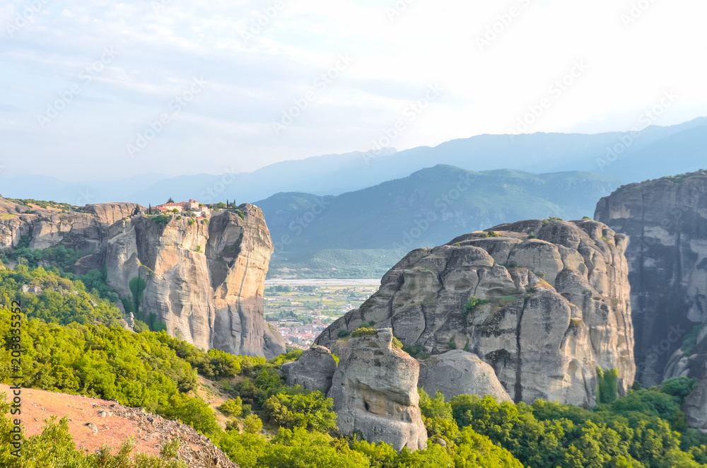 Greee, Meteora. Stunning spring panoramic landscape. View at mountains and green forest. Unesco heritage list object.