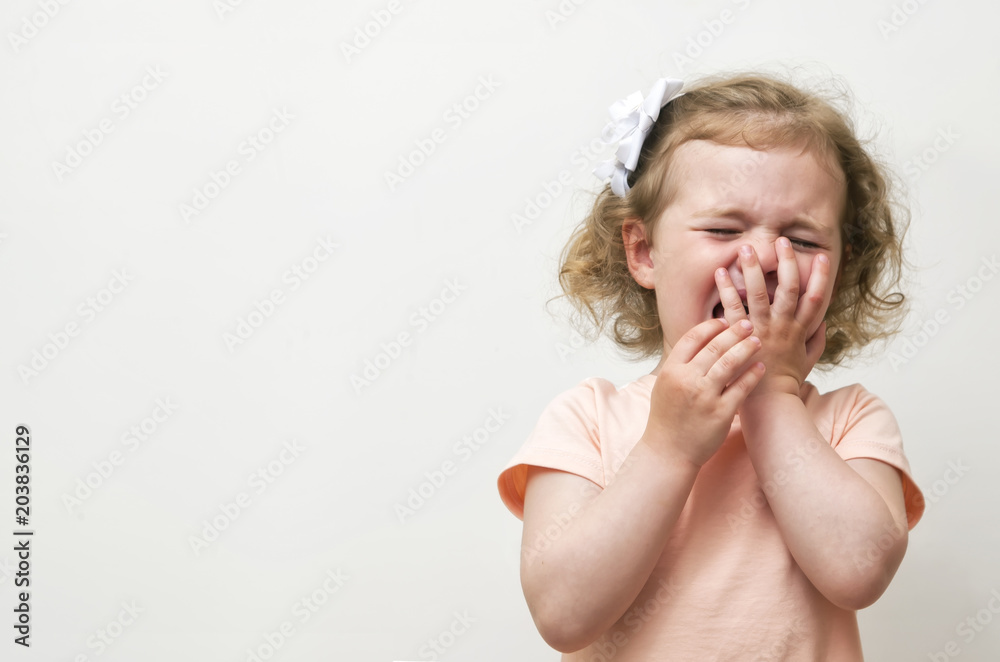 Girl crying over white background Girl crying over white background