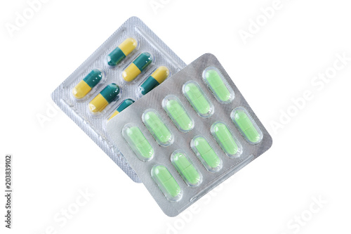 Pills in blister pack isolated on white background