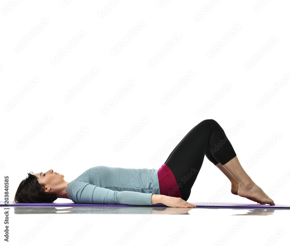 Mother woman exercising doing postnatal workout. Female fitness instructor stretching hands and legs in gym and work out exercises