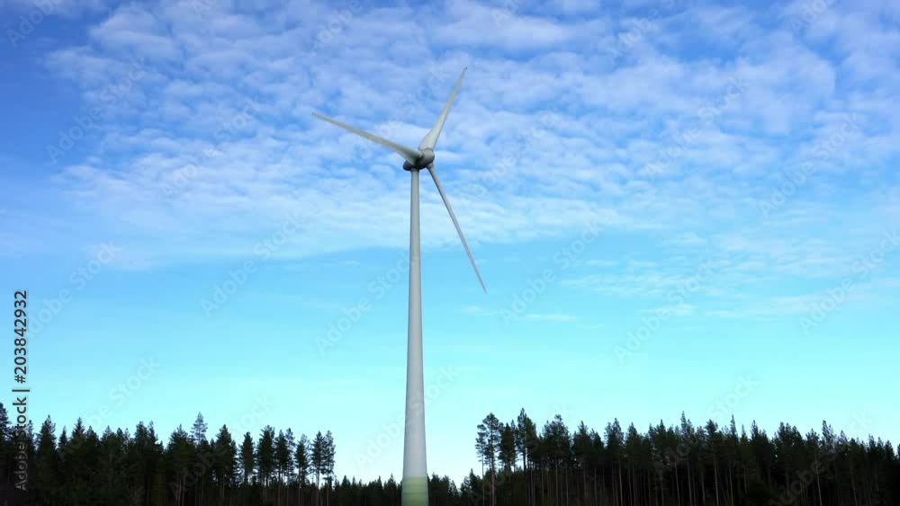 electrical windmill standing alone above pine tree forest sunny day sweden cold weather green pine trees end of winter altocumulus clouds electrical windmill standing alone above pine tree forest sunny day sweden cold weather green pine trees end of winter altocumulus clouds