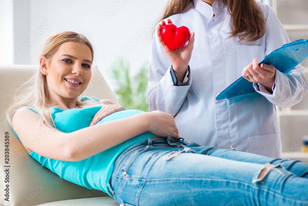 Pregnant woman at regular pregnancy check-up Pregnant woman at regular pregnancy check-up
