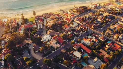 Aerial view above California beach city of La Jolla at sunset on beautiful clear day 