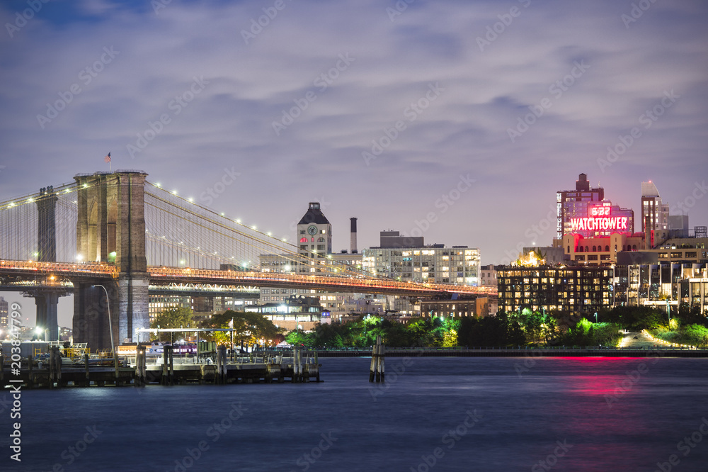 Obraz premium NEW YORK - USA - 29 OCTOBER 2017. View of Manhattan skyline illuminated at dusk over the Hudson River. New York City, USA.